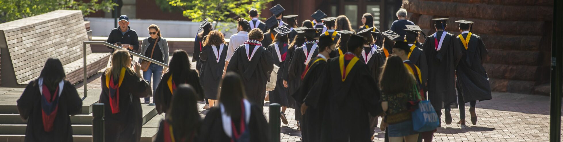 Students in Graduation Robes on Penn's Campus